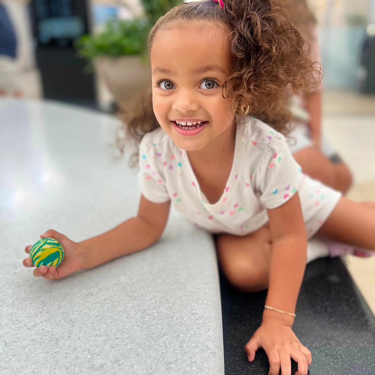 Zoey joined the competition — help win amazing prizes! adult, baby, babycrawling, ball, bodypart, child, crawling, face, female, finger, girl, hair, hand, head, male, man, person, sport, volleyball, volleyballball