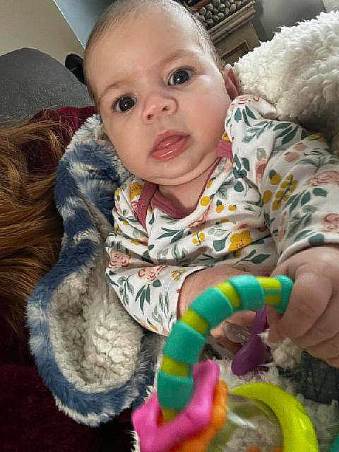 Destiny is registered to the contest to win money with this photo: baby, baby_products, baby_toddler_clothing, cheek, child, comfort, fun, happy, iris, mammal, nose, organ, pattern, person, play, sitting, skin, sleeve, textile, toddler