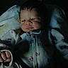 Rain joined the competition — help win amazing prizes! baby, infant, onesie, sleepwear, child, dark, shadow, face, hand, lying_down, blanket, newborn, cute, indoors, portrait, person, soft_light, cozy, warm, sleepy