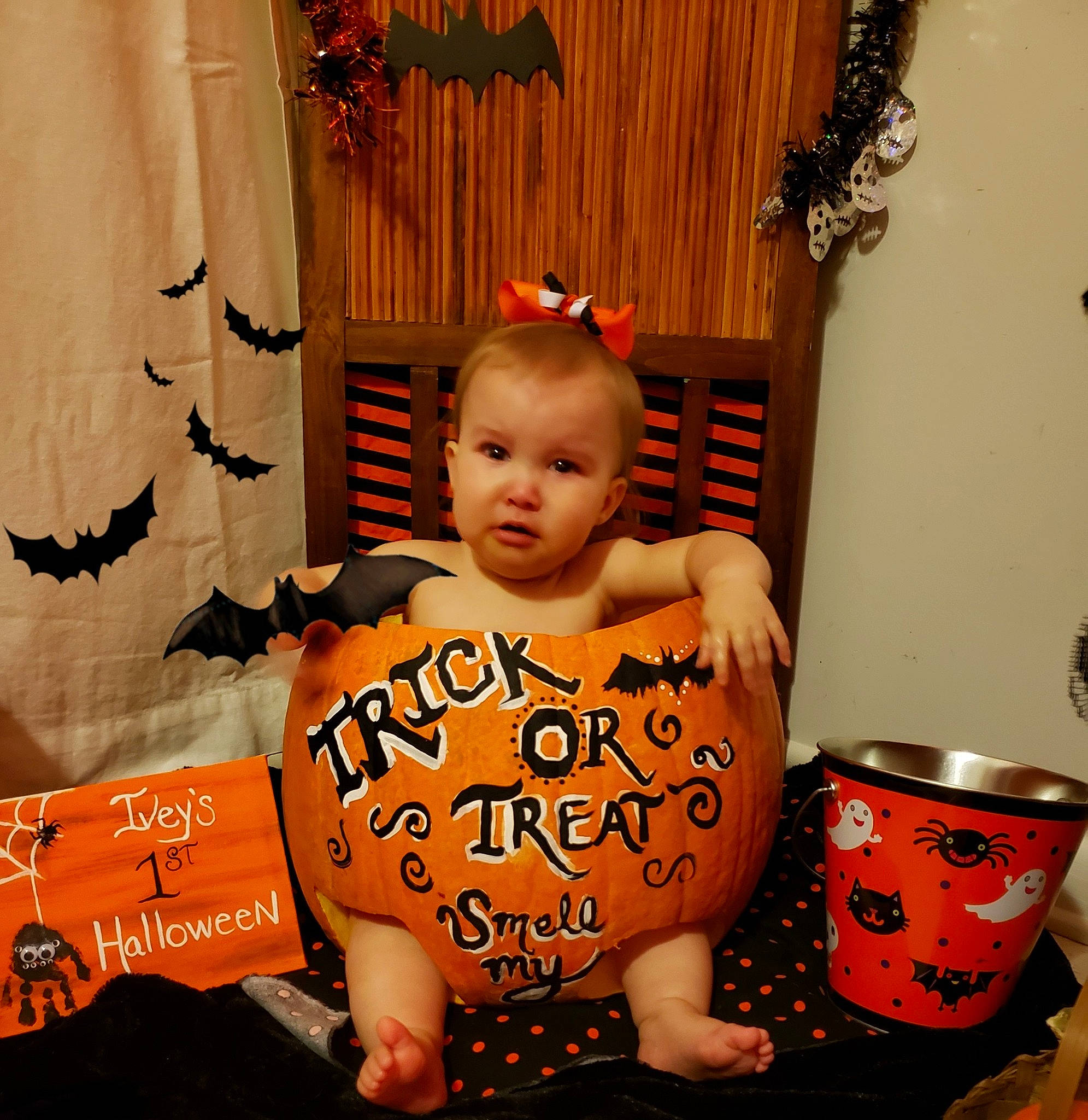 Ivey is registered to the contest to win money with this photo: calabaza, child, person, pumpkin, room, toddler