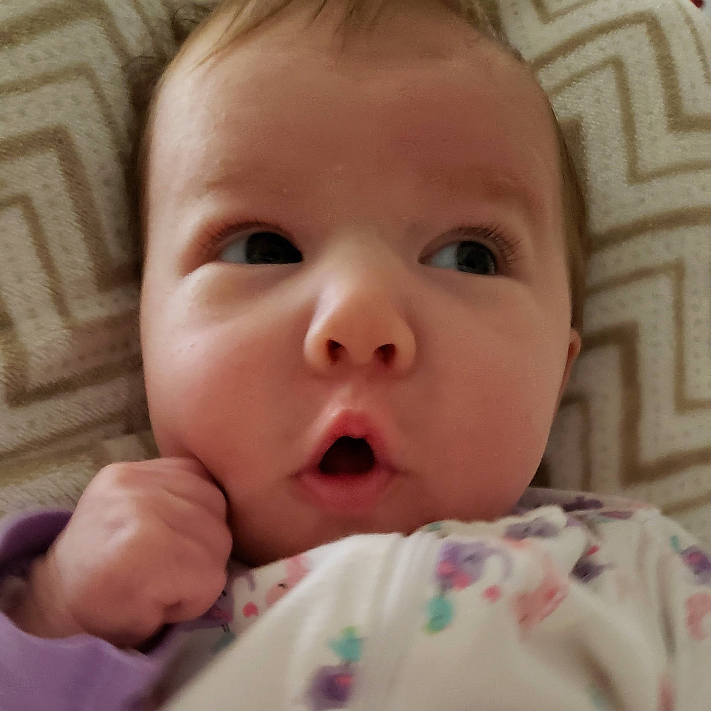 Ivey is registered to the contest to win money with this photo: baby, baby_making_funny_faces, bedtime, cheek, child, chin, close_up, ear, eye, face, facial_expression, finger, head, iris, lip, mouth, nose, person, skin, smile