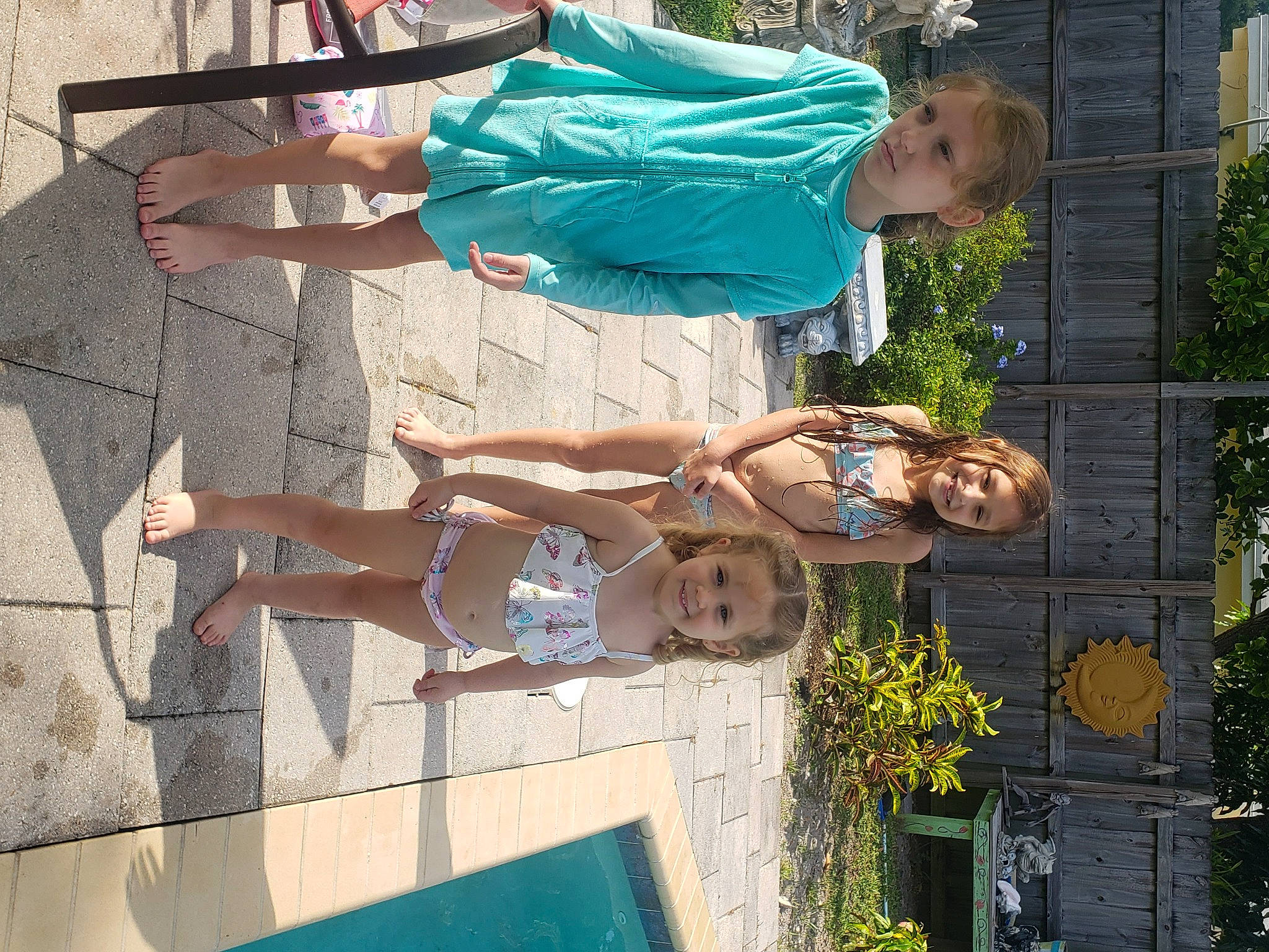 Alicia is registered to the contest to win money with this photo: arm, barechested, barefoot, chest, elbow, face, flowerpot, foot, fun, human_leg, joy, leisure, person, photograph, plant, shorts, swimwear, thigh, tree, vacation