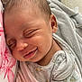 Nova is registered to the contest to win money with this photo: baby, sleeping, smiling, blanket, clothing, infant, face, head, closeup, soft, cozy, resting, cute, peaceful, child, portrait, newborn, indoors, fabric, comfort