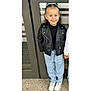Maëlyne participe au concours pour gagner de l'argent avec cette photo : child, girl, smiling, leather_jacket, blue_jeans, white_sneakers, hair_bows, standing, holding_hands, door, concrete_floor, casual_clothing, outdoor, happy, portrait, fashion, young, person, friendship, hair
