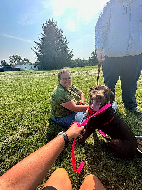 Rileymae is registered to the contest to win money with this photo: carnivore, cloud, dog, eyewear, fun, grass, grassland, happy, knee, lap, leg, leisure, people_in_nature, plant, recreation, shorts, sky, sunglasses, thigh, tree