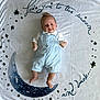 Carson joined the competition — help win amazing prizes! baby, infant, child, blanket, stars, moon, overalls, blue, white, smiling, cute, lying_down, text, decor, soft, cozy, portrait, toddler, face, happy