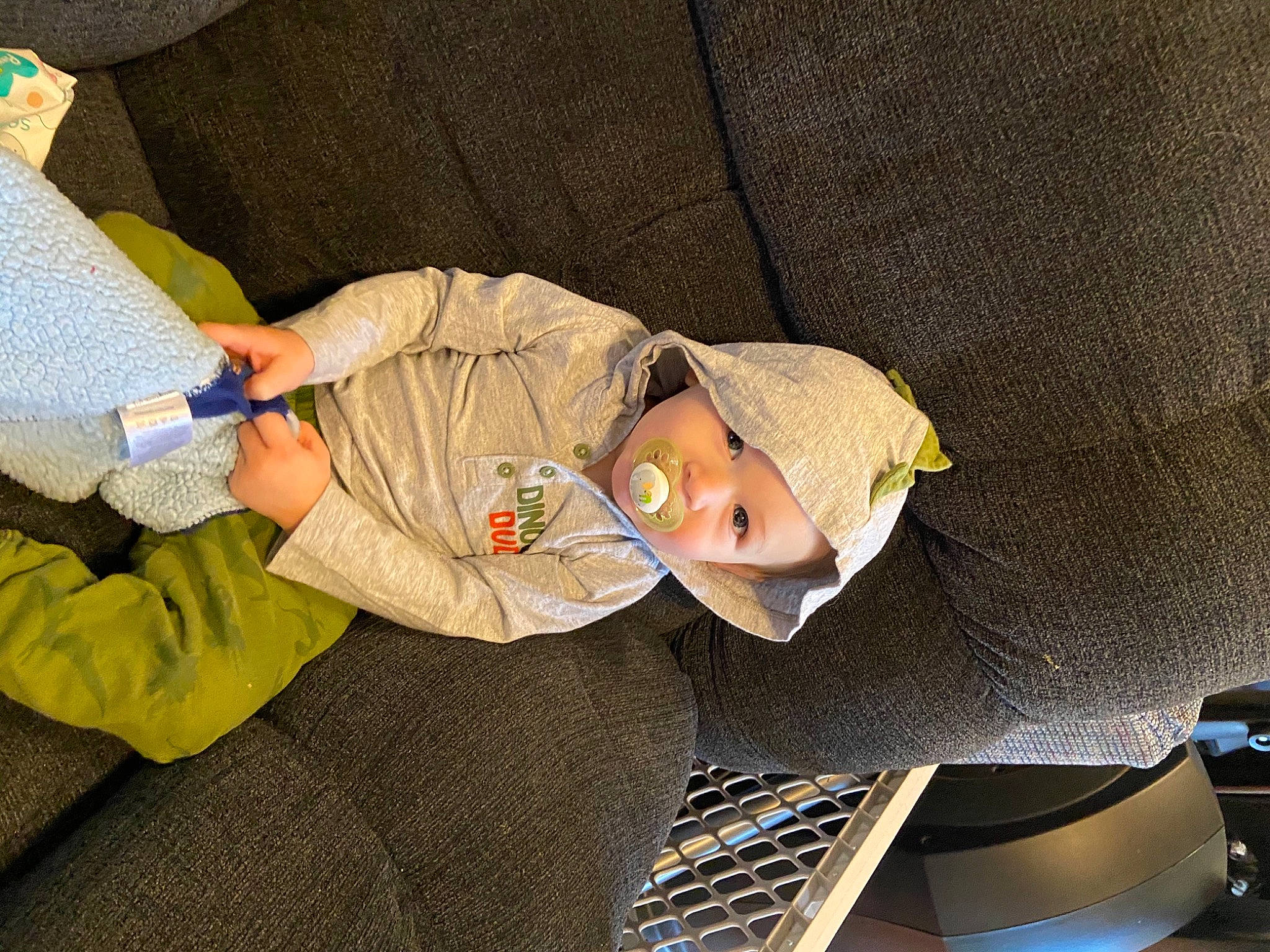 Rhyder is registered to the contest to win money with this photo: baby, baby_products, baby_toddler_clothing, child, comfort, couch, eye, hat, headwear, lap, linens, person, room, sitting, textile, toddler