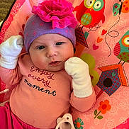 Riley joined the competition — help win amazing prizes! baby, infant, hat, mittens, pink, purple, playmat, owl, flower, pacifier, clothing, cute, child, portrait, smiling, indoor, colorful, happy, face, person