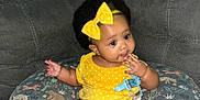 Isabella joined the competition — help win amazing prizes! baby, bow, child, couch, curly_hair, cute, finger, hand, headband, indoor, infant, nursing_pillow, pacifier_clip, polka_dot, portrait, seated, skin, sofa, yellow_clothing, young_child