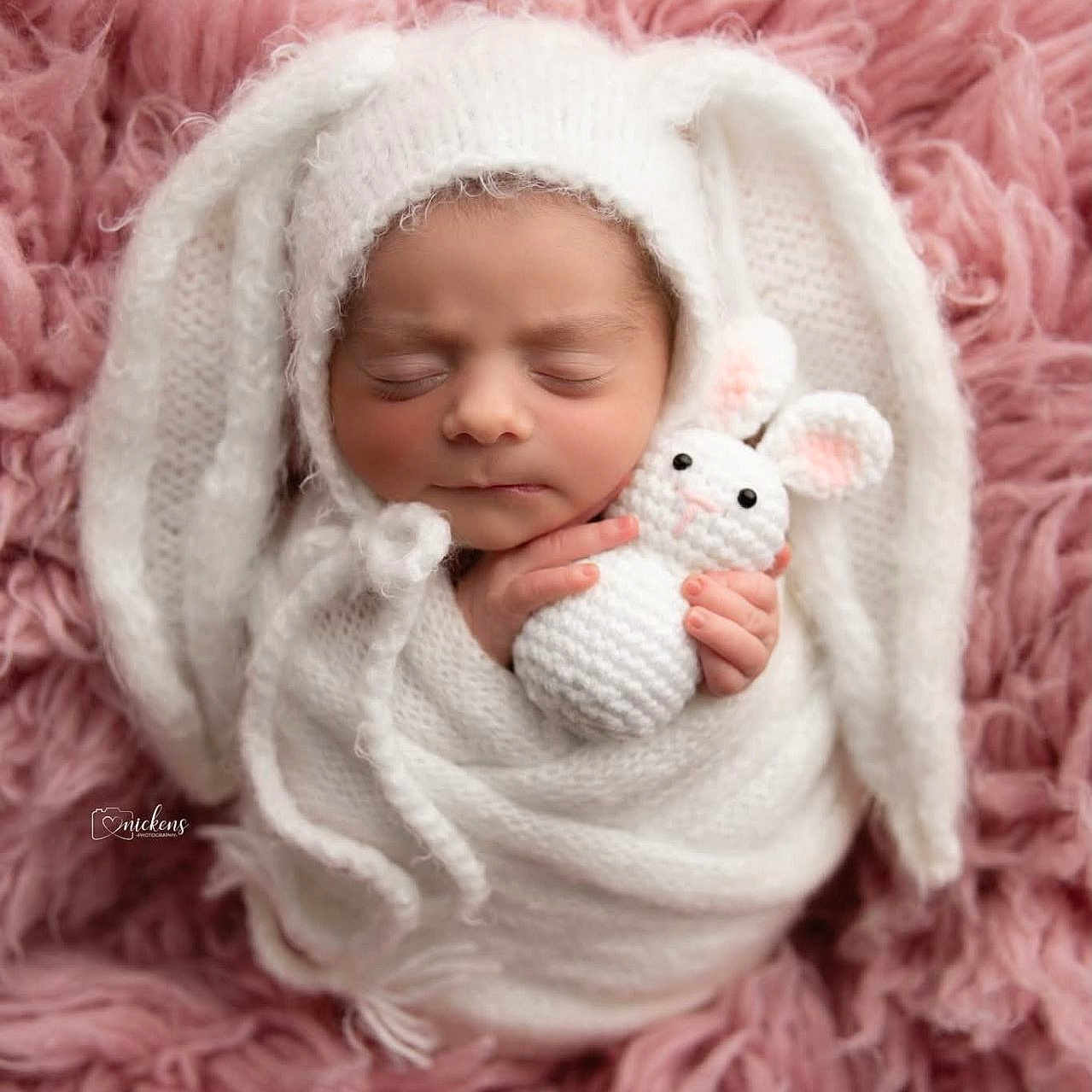 Kyliee is registered to the contest to win money with this photo: baby, newborn, sleeping, plush_bunny, pink_blanket, knit_hat, swaddle, cozy, soft_texture, closed_eyes, tiny_hands, cute, portrait, newborn_photography, props, wool, pastel_colors, studio_style, infant, adorable