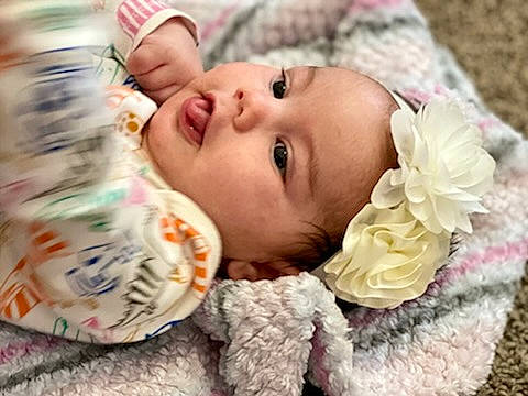 Grace joined the competition — help win amazing prizes! baby, baby_toddler_clothing, cheek, child, comfort, eyelash, face, finger, hand, happy, headgear, headwear, iris, lip, mouth, person, petal, skin, smile, textile