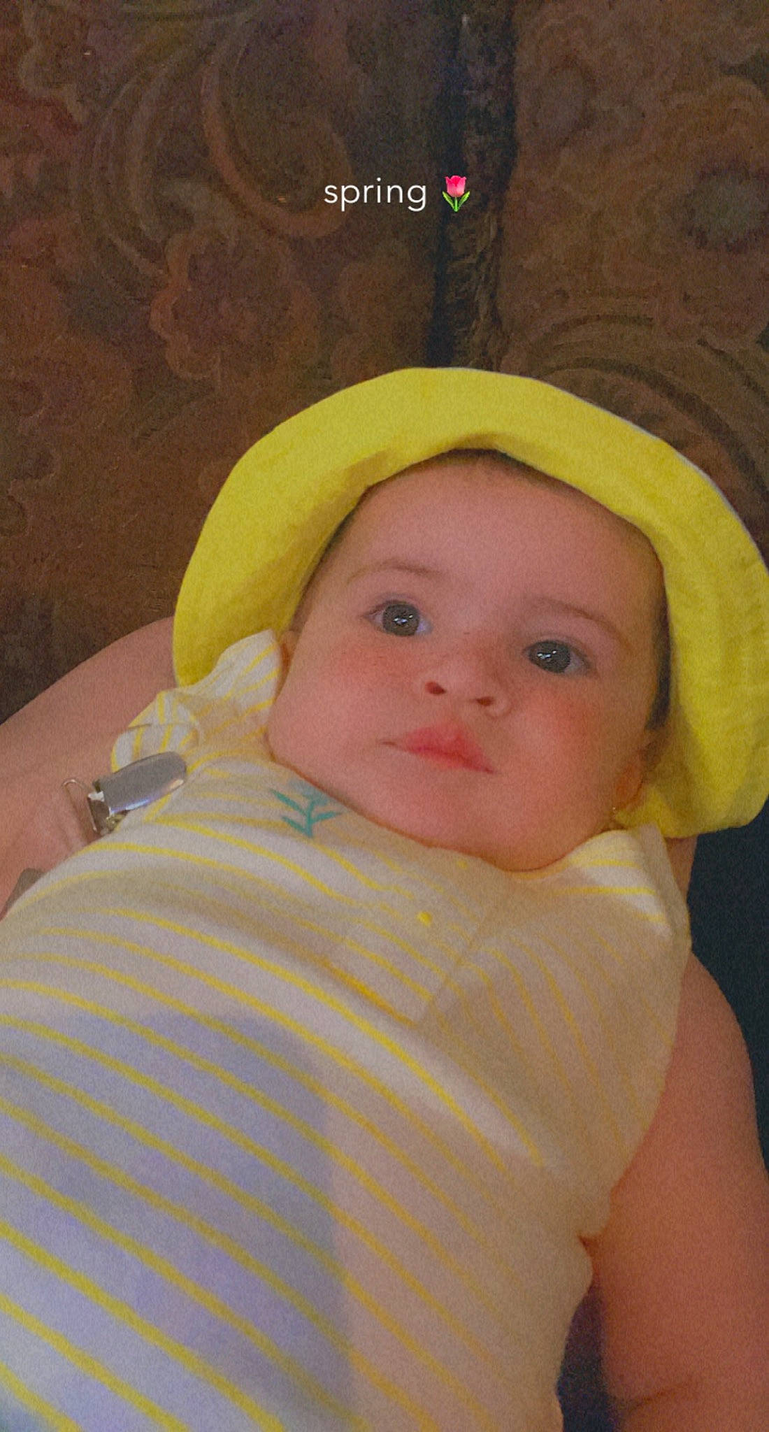 Jane is registered to the contest to win money with this photo: baby, baby_toddler_clothing, cap, cheek, chin, eye, eyebrow, face, fashion_accessory, happy, hat, headgear, iris, lip, nose, person, skin, sleeve, smile, sun_hat