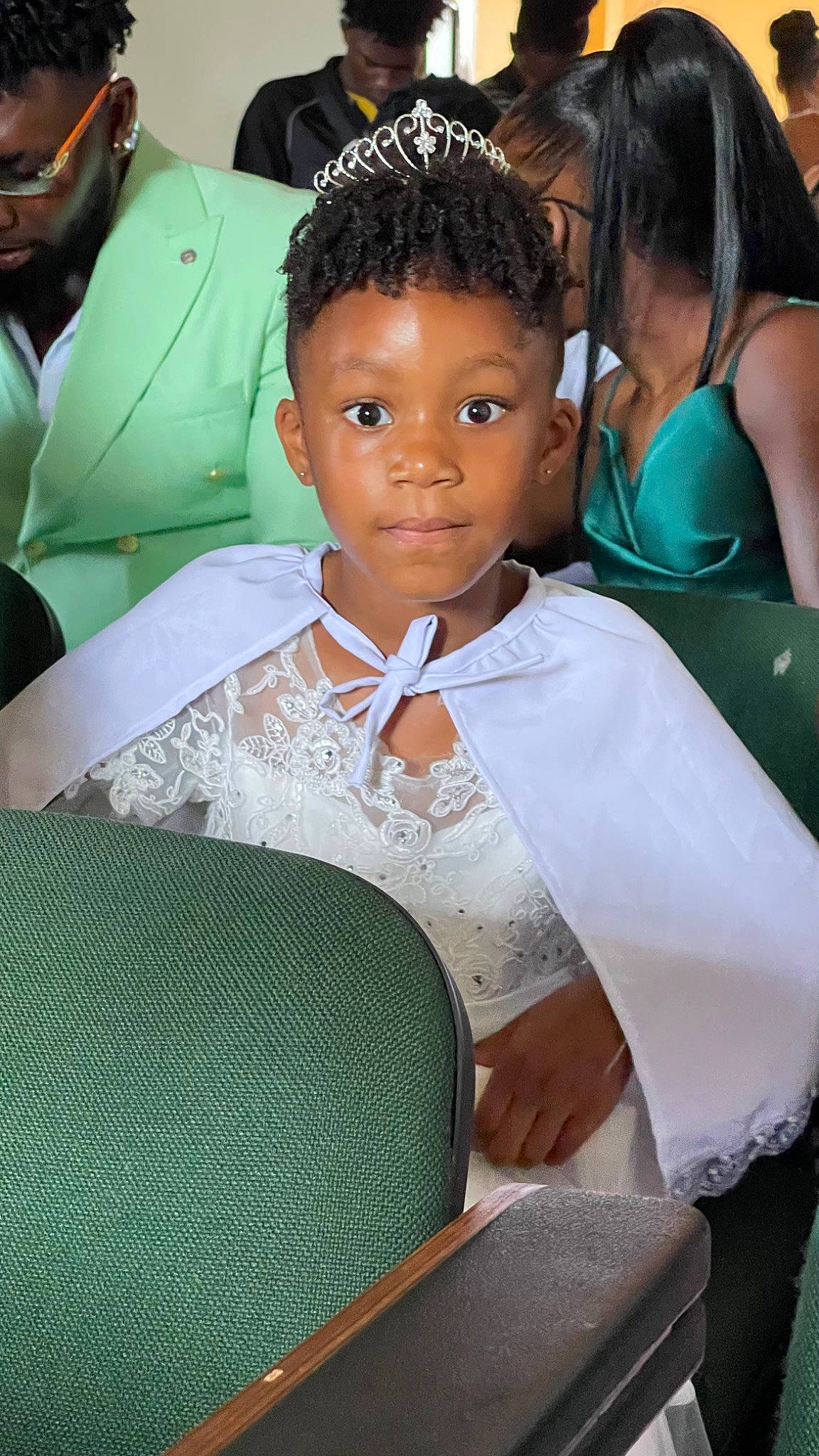 Elena participe au concours pour gagner de l'argent avec cette photo : chair, child, costume, event, eyewear, fashion_accessory, fashion_design, formal_wear, fun, hair, hairstyle, happy, headgear, jewellery, necklace, organ, person, sitting, toddler, tradition