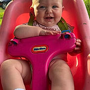 Elizabeth is registered to the contest to win money with this photo: baby, car, child, childhood, forest, fun, grass, happy, house, nature, outdoor, person, pink_swing, play, seat, smiling, socks, summer, sunlight, swing