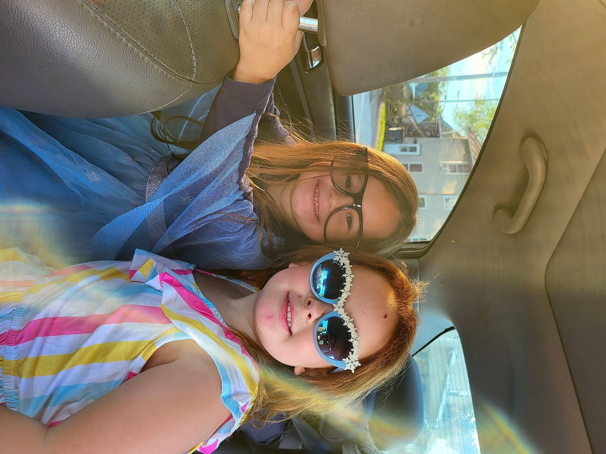 Kaleena is registered to the contest to win money with this photo: automotive_design, comfort, cool, eyewear, facial_expression, finger, fun, gesture, happy, joint, joy, leisure, motor_vehicle, mouth, person, skin, smile, sunglasses, vehicle_door, vision_care