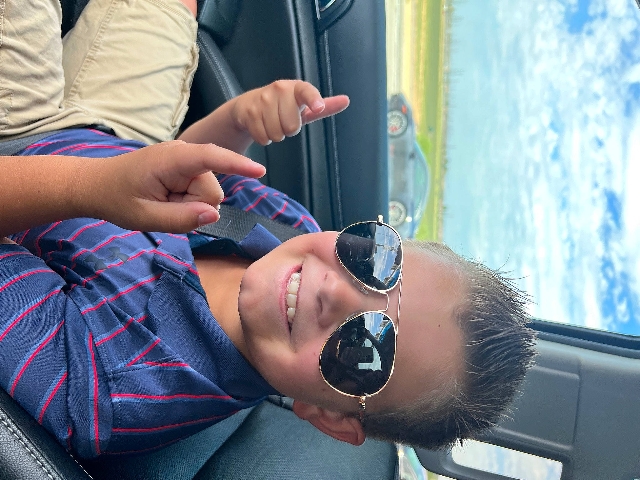 Camden joined the competition — help win amazing prizes! automotive_design, automotive_exterior, automotive_lighting, electric_blue, eyewear, finger, glasses, hand, joint, joy, leisure, motor_vehicle, mouth, person, personal_protective_equipment, smile, sunglasses, vehicle_door, vision_care, water