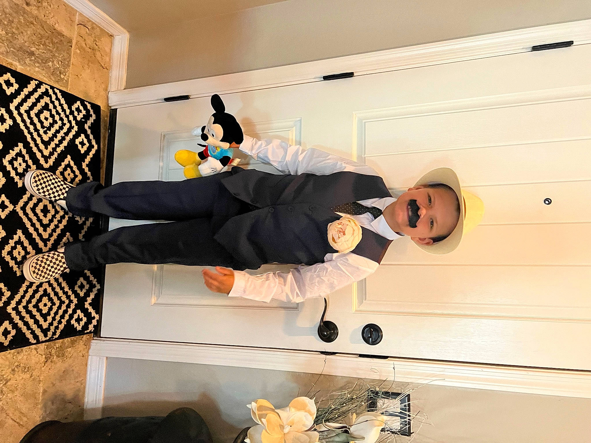 Camden is registered to the contest to win money with this photo: art, ceiling, comfort, flooring, fun, hardwood, hat, joy, person, room, wood