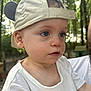 toddler, child, cap, hat, white_shirt, outdoor, nature, trees, portrait, closeup, blue_eyes, face, person, casual, daylight, skin, cute, expression, young_child, summer
