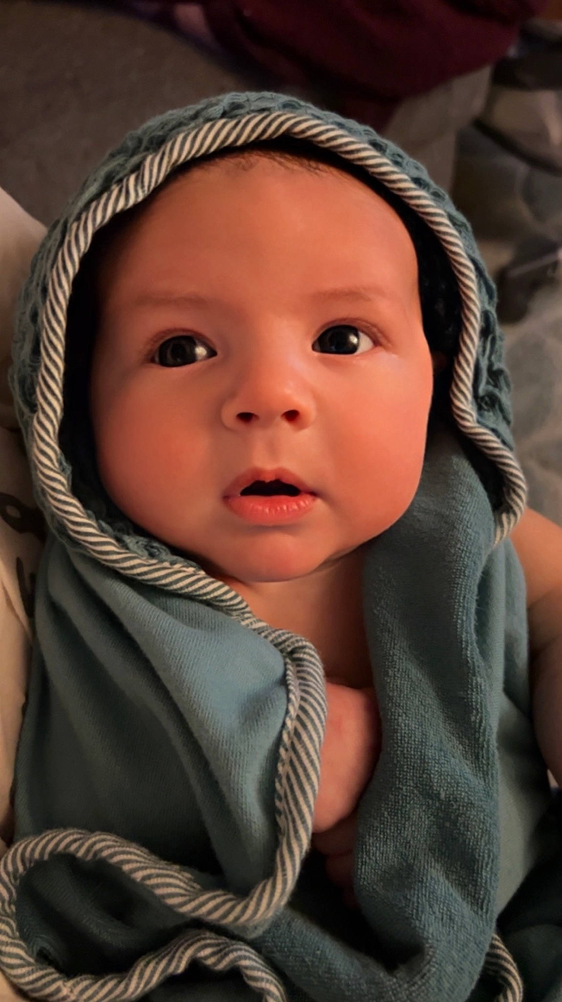 Cameron is registered to the contest to win money with this photo: baby, baby_carriage, baby_products, cap, cheek, child, chin, close_up, comfort, eyebrow, eyelash, facial_expression, flash_photography, headwear, iris, lip, mammal, outerwear, person, product