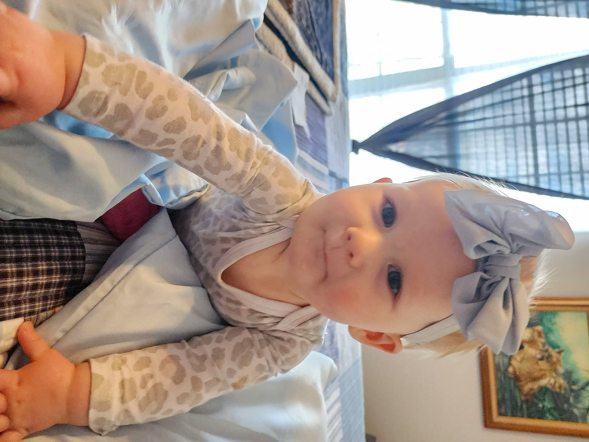 Iris joined the competition — help win amazing prizes! baby, chest, child, comfort, elbow, eyelash, fun, happy, mouth, pattern, person, picture_frame, plaid, room, sitting, smile, tartan, toddler, vacation