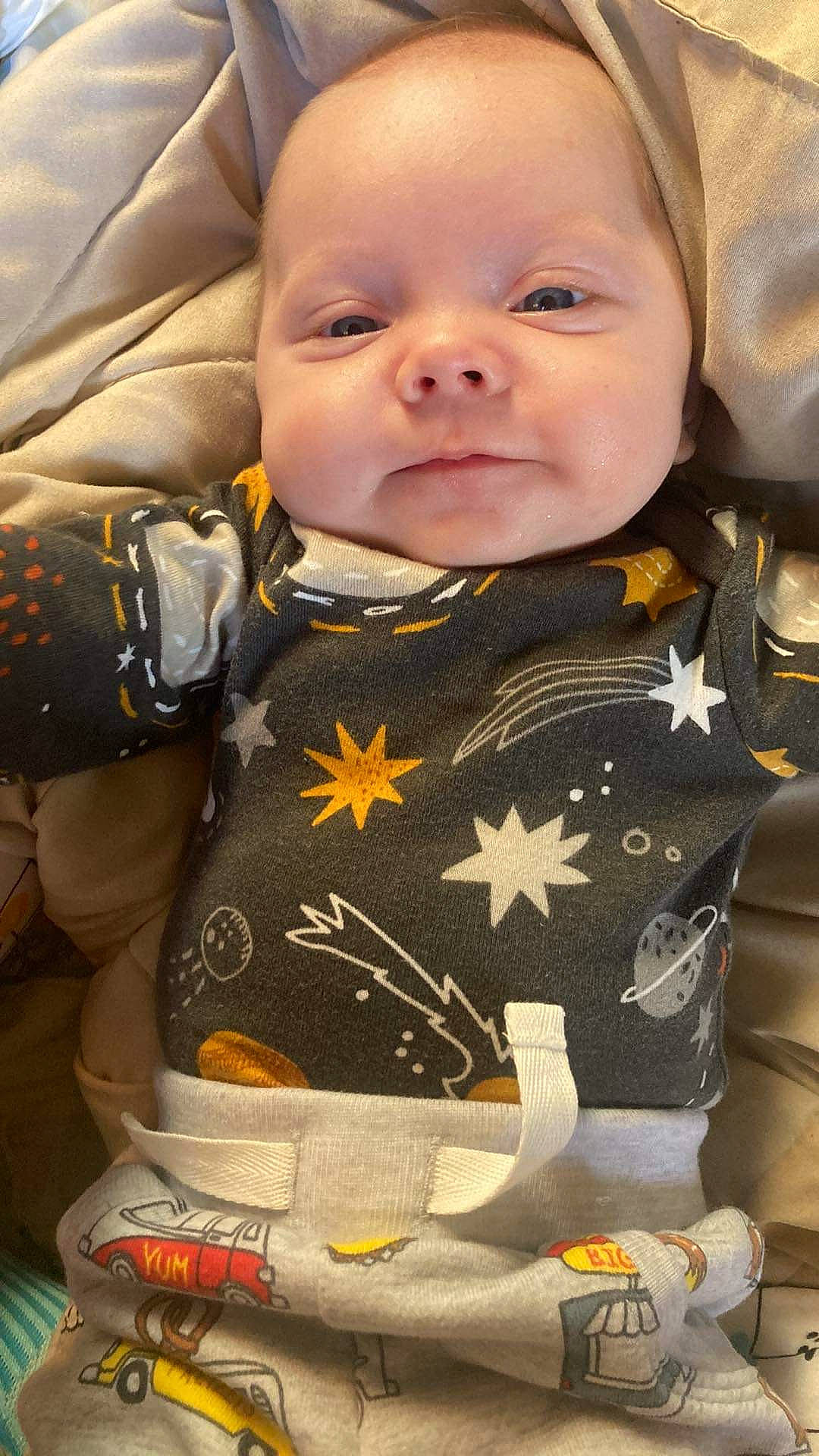 Easton joined the competition — help win amazing prizes! baby, baby_products, baby_toddler_clothing, bib, cheek, child, collar, formal_wear, gesture, happy, military_camouflage, military_person, military_uniform, non_commissioned_officer, outerwear, pattern, person, sleeve, smile, toddler