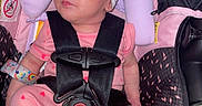 Kaylonni joined the competition — help win amazing prizes! accessory, apparel, baby, car_seat, child, child_safety, cute, fabric, headband, indoors, infant, newborn, pattern, pink_clothing, portrait, resting, safety_harness, seat, sleeping, toddler
