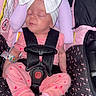 accessory, apparel, baby, car_seat, child, child_safety, cute, fabric, headband, indoors, infant, newborn, pattern, pink_clothing, portrait, resting, safety_harness, seat, sleeping, toddler