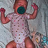 Kaylonni is registered to the contest to win money with this photo: arms, baby, bed, blanket, child, cute, footwear, indoors, infant, legs, newborn, onesie, pacifier, pattern, peaceful, pink, polka_dots, resting, sleeping, soft