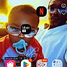 Allandrius joined the competition — help win amazing prizes! baby, adult, sunglasses, pacifier, selfie, smartphone_screen, app_icons, notifications, indoor, family, portrait, casual, glasses, child, person, technology, screen_overlay, warm_light, seated, relaxed