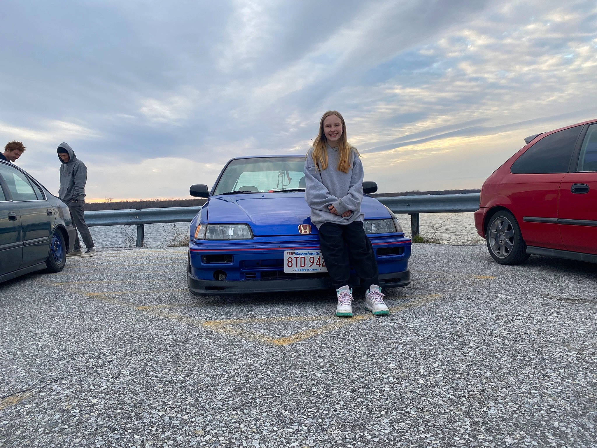 Skylynn is registered to the contest to win money with this photo: alloy_wheel, asphalt, automotive_design, automotive_exterior, automotive_lighting, automotive_tire, bumper, car, cloud, headwear, hood, joy, land_vehicle, motor_vehicle, person, personal_luxury_car, rim, rolling, sky, street_fashion