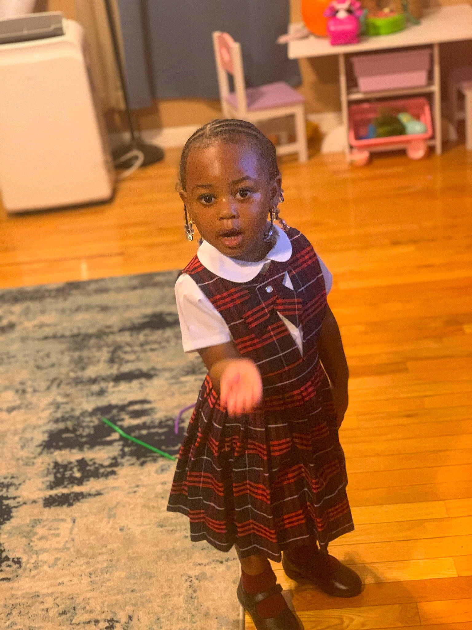 Arya joined the competition — help win amazing prizes! baby, baby_toddler_clothing, chair, child, door, floor, flooring, happy, hardwood, laminate_flooring, pattern, person, plaid, sandal, skin, sleeve, surprise, tartan, toddler, varnish