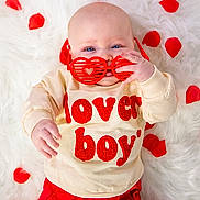 Ash joined the competition — help win amazing prizes! adorable, baby, baby_boy, baby_girl, blue_eyes, child, clothing, cream_sweater, cute, fashion, fluffy_surface, heart_shaped_sunglasses, indoor, infant, lying_down, playful, portrait, red_pants, rose_petals, soft_texture