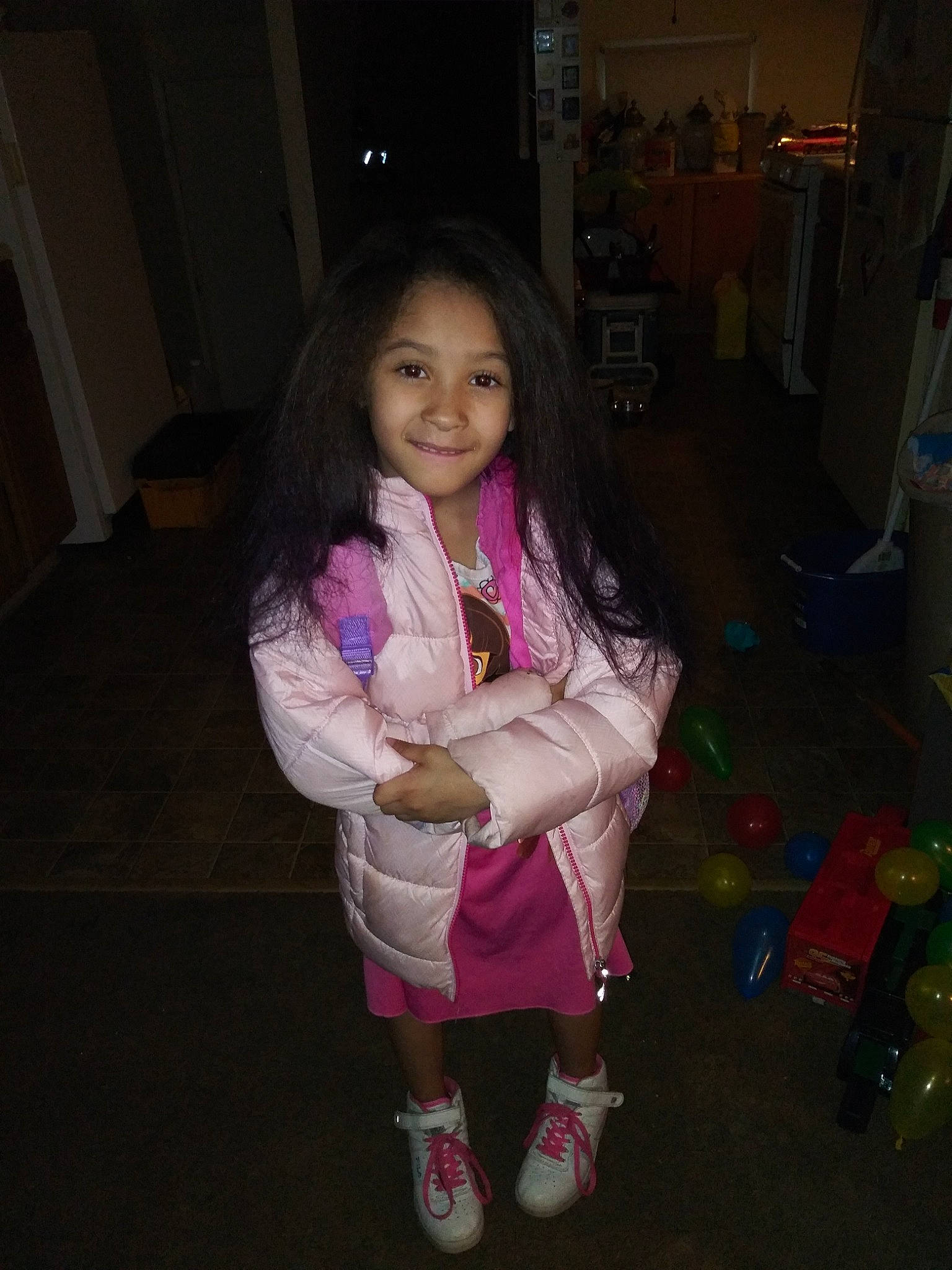 Symphony is registered to the contest to win money with this photo: black_hair, cheek, child, daughter, eye, face, fun, iris, joy, long_hair, person, pink, skin, smile, snapshot, toddler, vacation