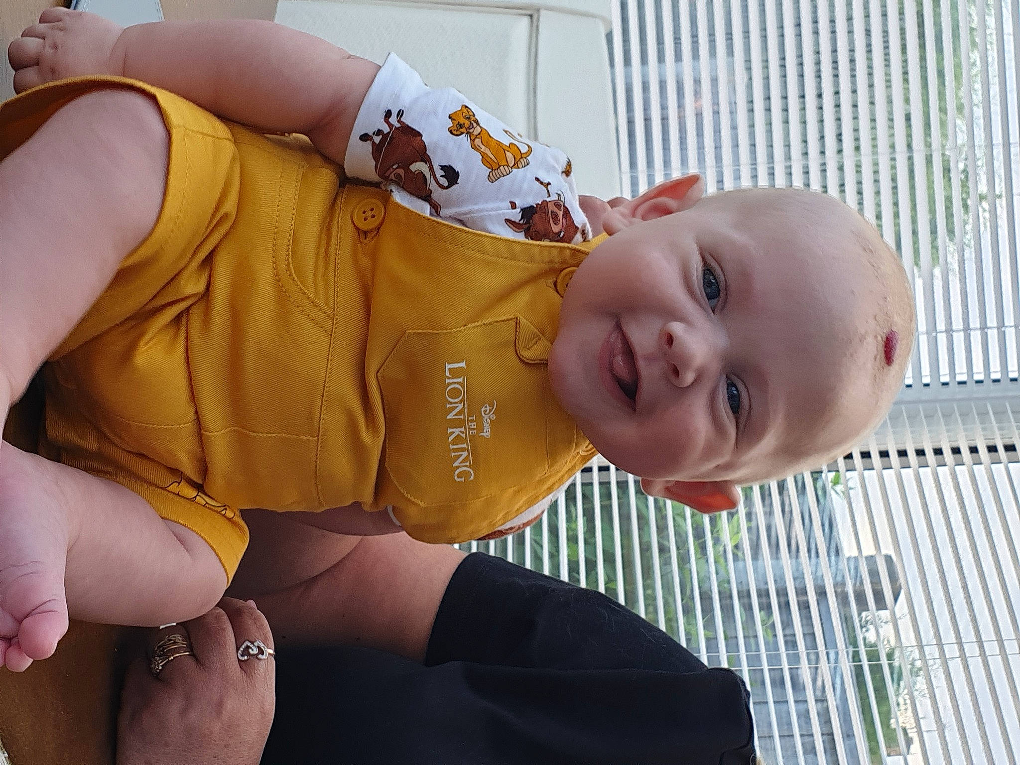 Duncan is registered to the contest to win money with this photo: baby, child, finger, hand, person, toddler, yellow