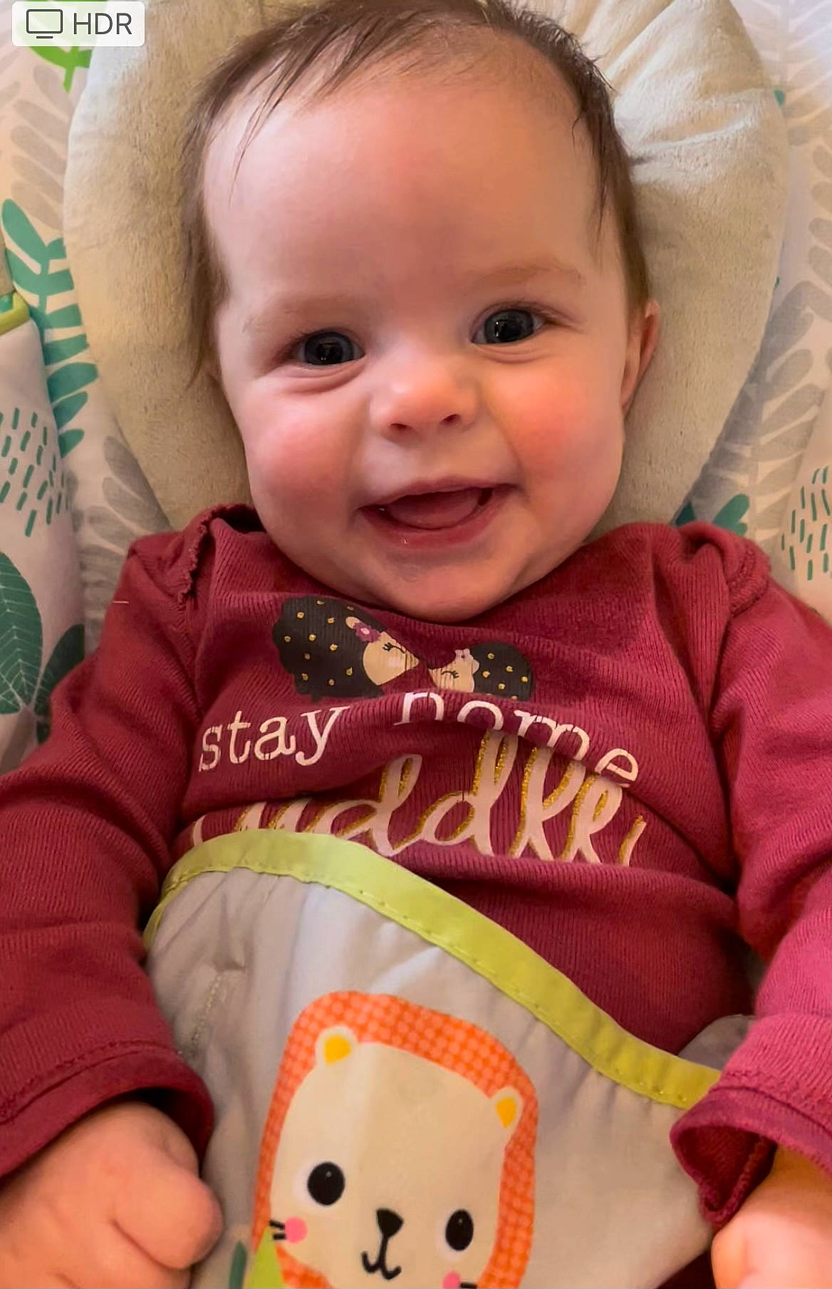 Elysia is registered to the contest to win money with this photo: baby, baby_toddler_clothing, cheek, face, facial_expression, finger, happy, human, joy, lip, mammal, mouth, nose, organ, person, pink, product, skin, sleeve, smile