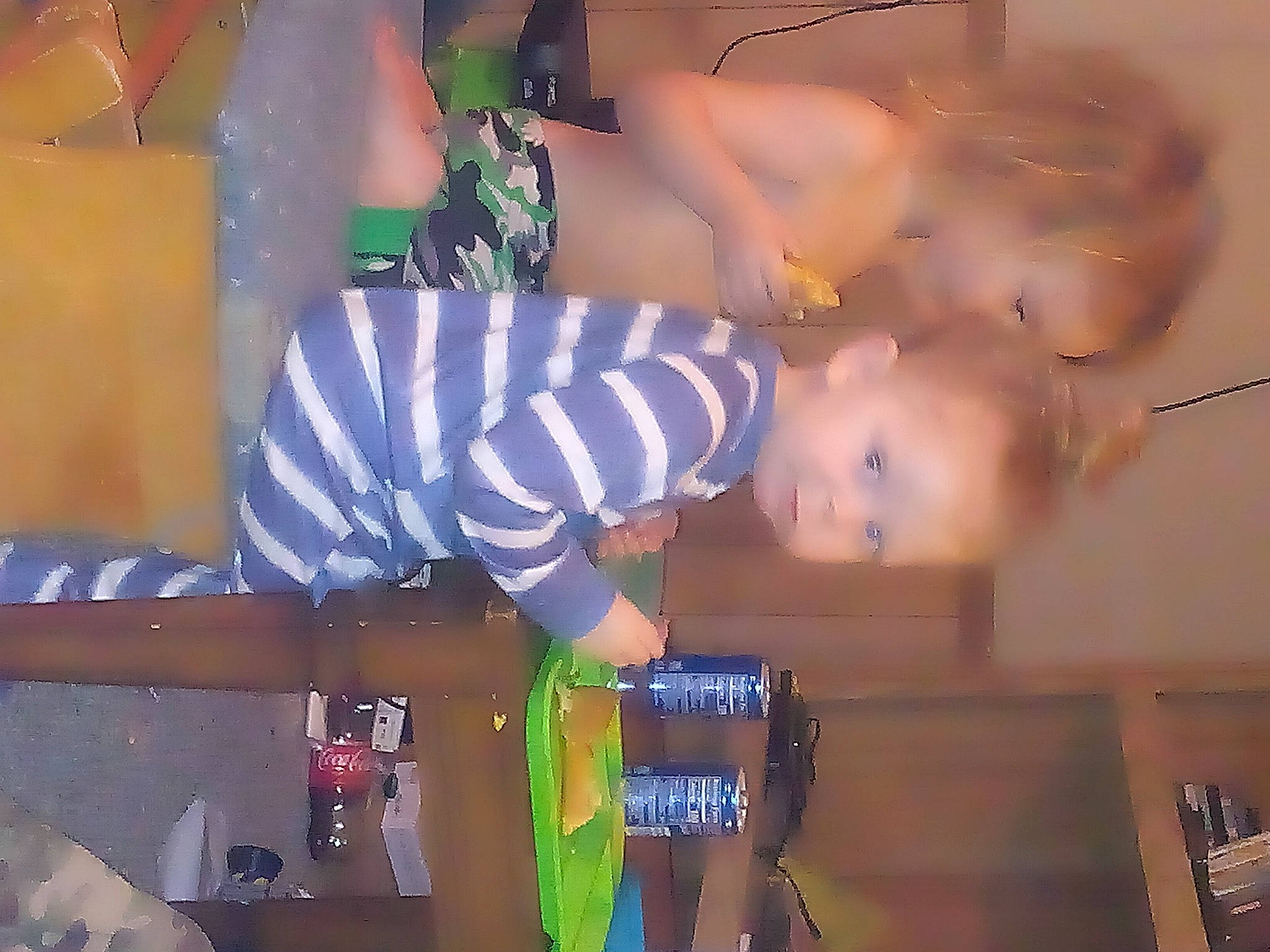 Toby is registered to the contest to win money with this photo: art, artist, child, entertainment, event, fun, happy, leisure, party_supply, performance, performance_art, performing_arts, person, room, tree, visual_arts, water, world