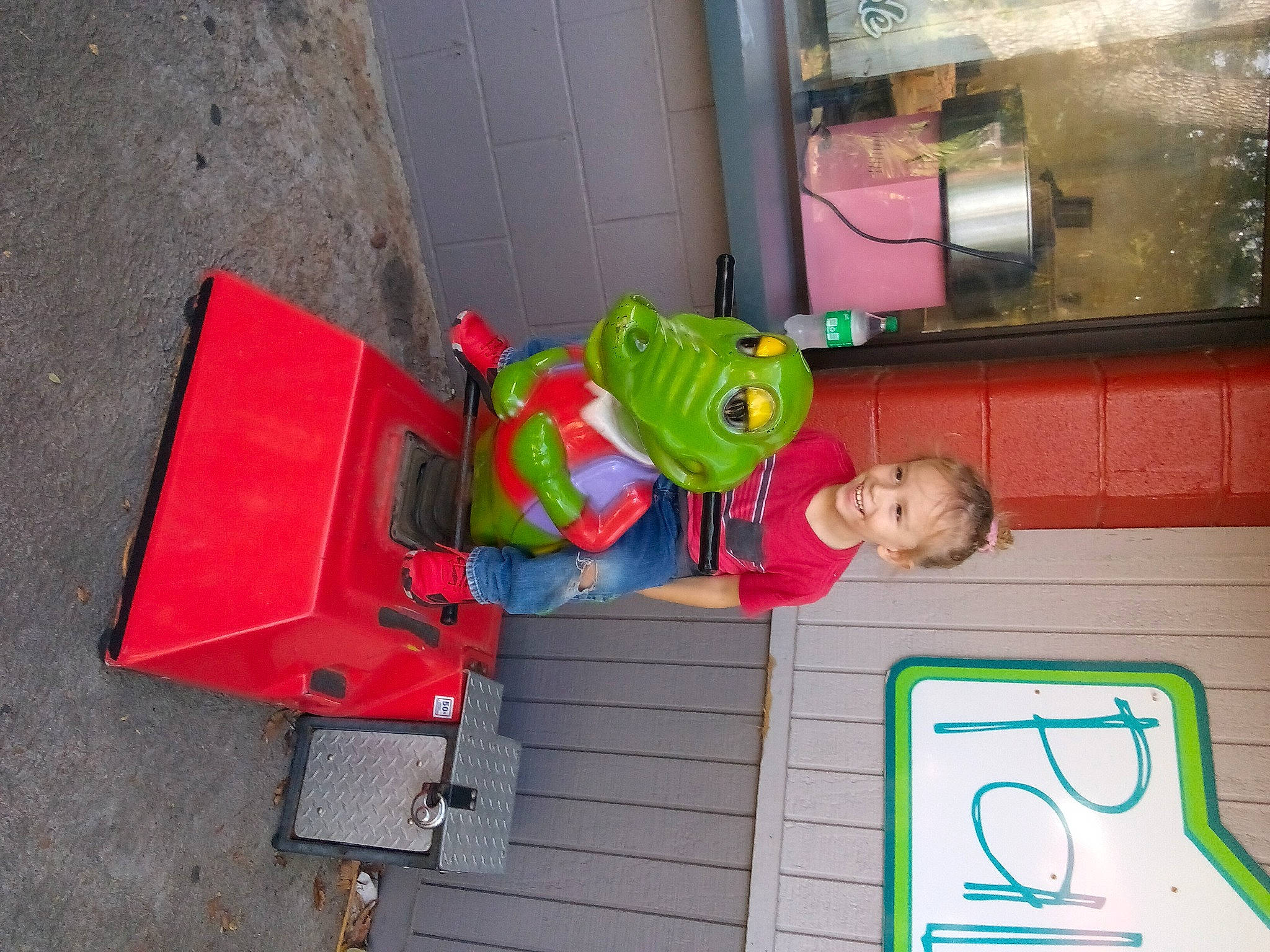 Davian is registered to the contest to win money with this photo: child, concrete, flooring, fun, joy, leisure, machine, magenta, person, plastic, play, room, toddler, toy, visual_arts, wood