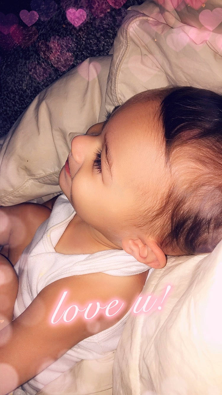 Olivia Sky is registered to the contest to win money with this photo: baby, baby_toddler_clothing, cheek, comfort, eye, eyebrow, eyelash, face, finger, forehead, happy, human_body, iris, lip, mouth, neck, nose, person, pink, skin