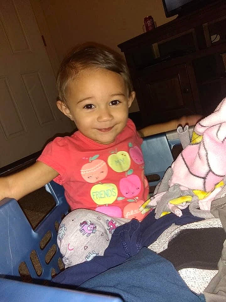 Olivia Sky is registered to the contest to win money with this photo: arm, baby, baby_products, baby_toddler_clothing, cheek, child, comfort, finger, fun, head, human_body, iris, joy, lap, mouth, person, pink, skin, smile, thumb