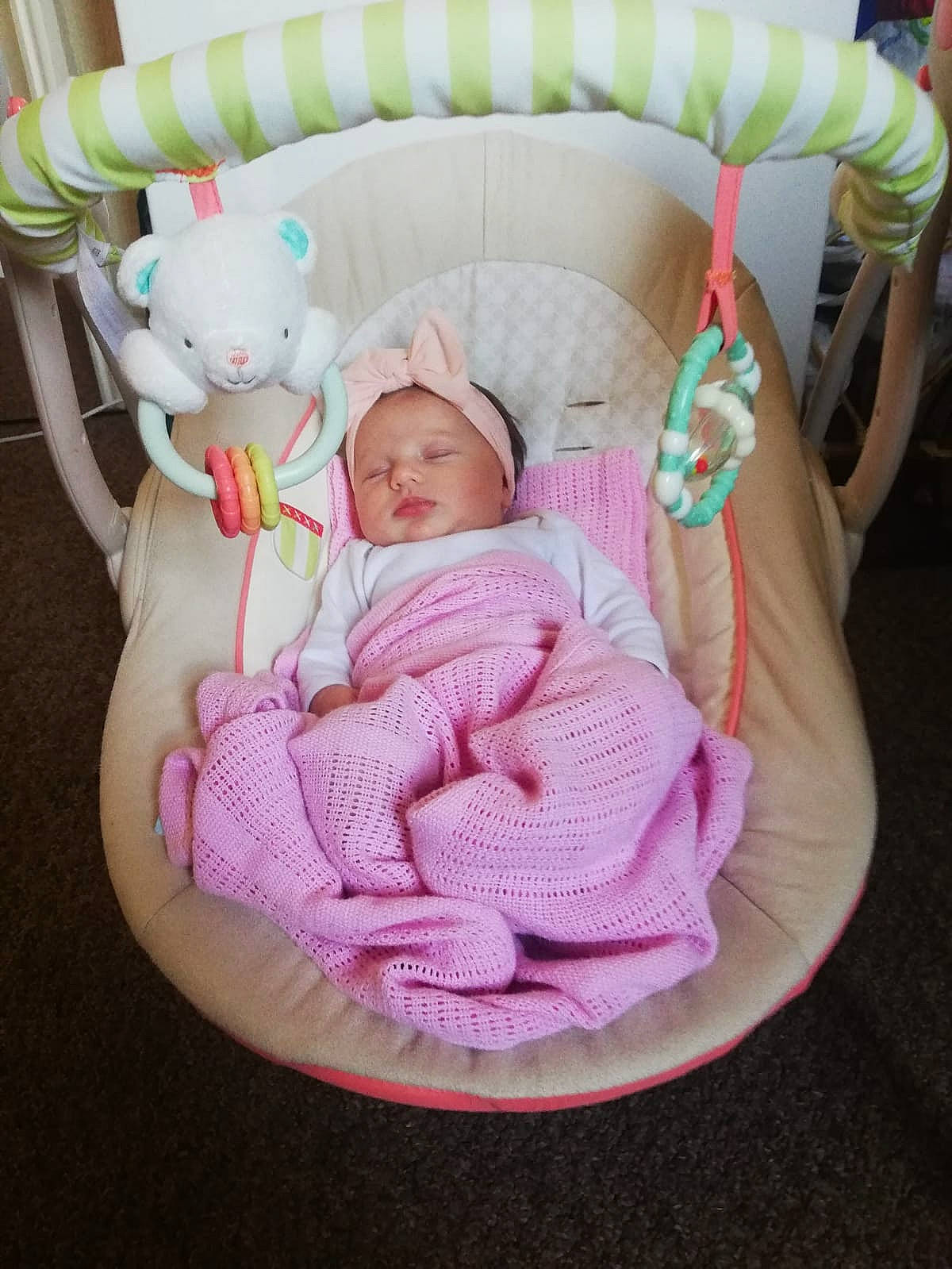 Elisa is registered to the contest to win money with this photo: baby, baby_products, baby_sleeping, baby_toys, child, comfort, furniture, infant_bed, person, pink, product, sleep, toddler