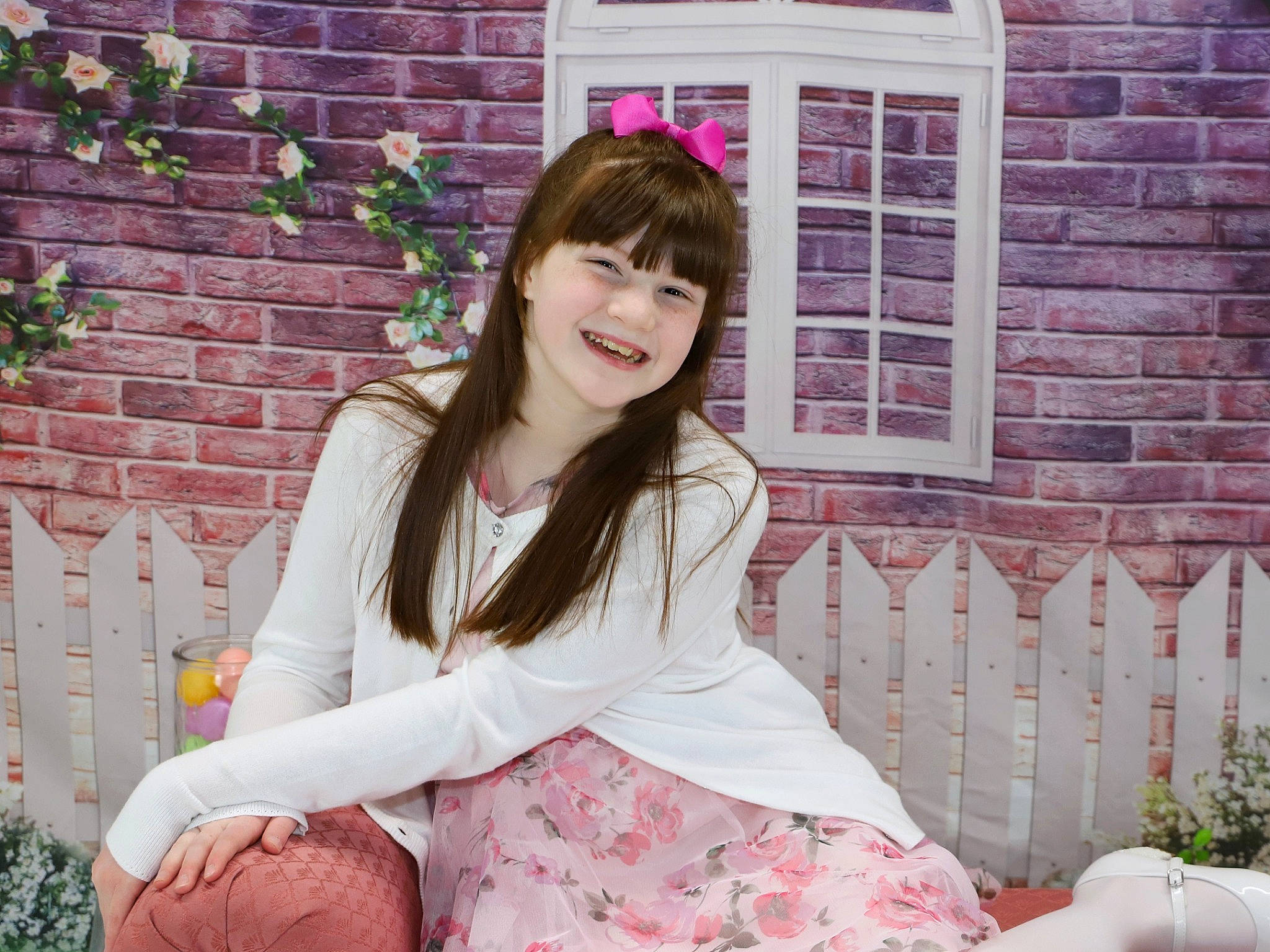 Madyson joined the competition — help win amazing prizes! beauty, brick, brown_hair, event, floral_design, grass, happy, human_leg, joy, knee, magenta, pattern, person, pink, plant, sitting, sleeve, smile, textile, thigh