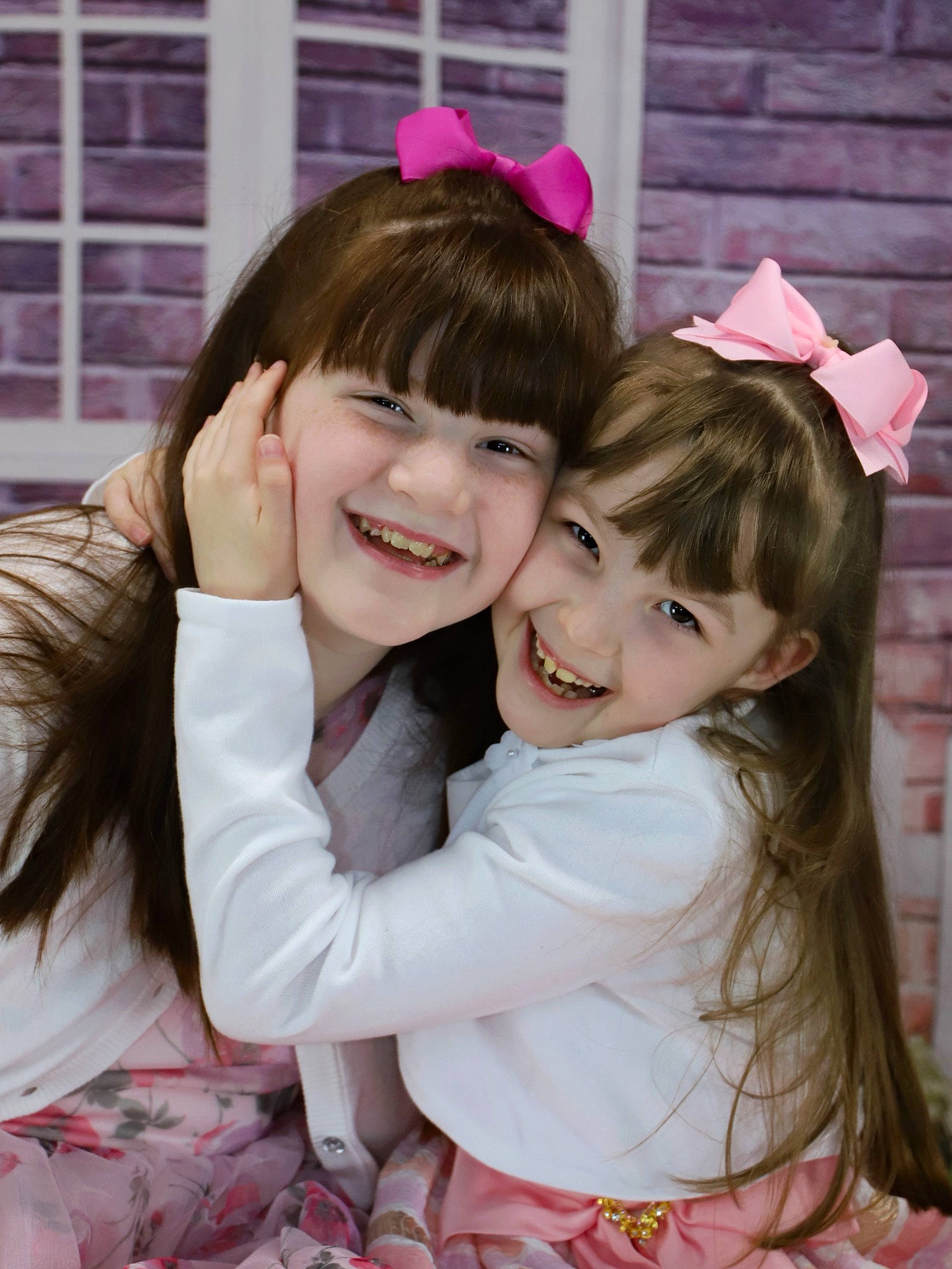 Kyleigh is registered to the contest to win money with this photo: bangs, blond, brown_hair, child, event, facial_expression, fashion_accessory, formal_wear, fun, gesture, happy, headpiece, hug, joy, laugh, magenta, person, pink, smile, toddler