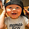 toddler, child, boy, smiling, blue_eyes, cap, backwards_cap, tshirt, mamas_boy, hands, face, indoor, wooden_floor, happy, cute, baby, portrait, casual, playful, closeup
