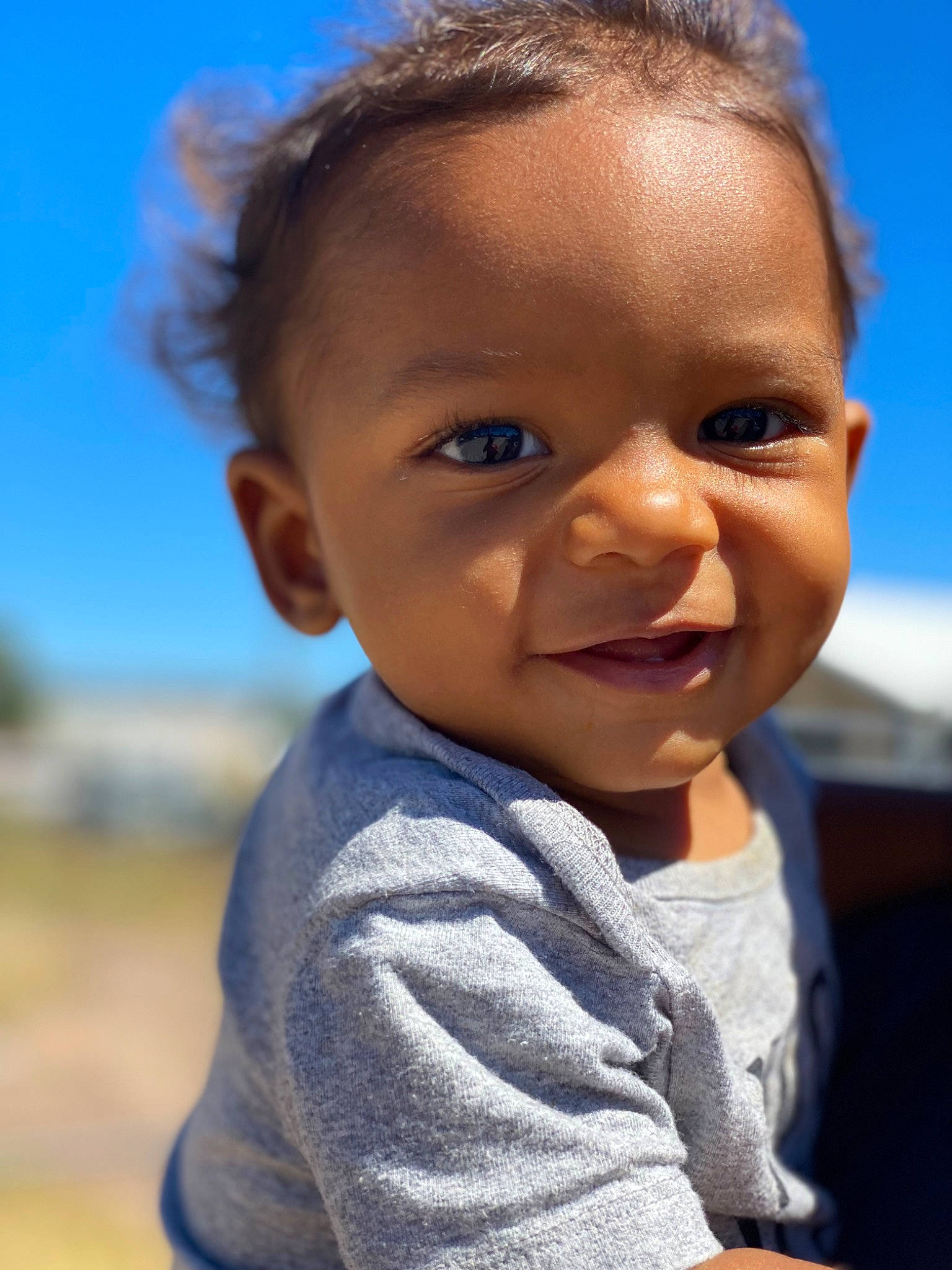 Zion joined the competition — help win amazing prizes! baby, baby_toddler_clothing, cheek, child, close_up, flash_photography, fun, grass, hair, happy, iris, lip, nose, person, skin, sky, sleeve, smile, t_shirt, toddler