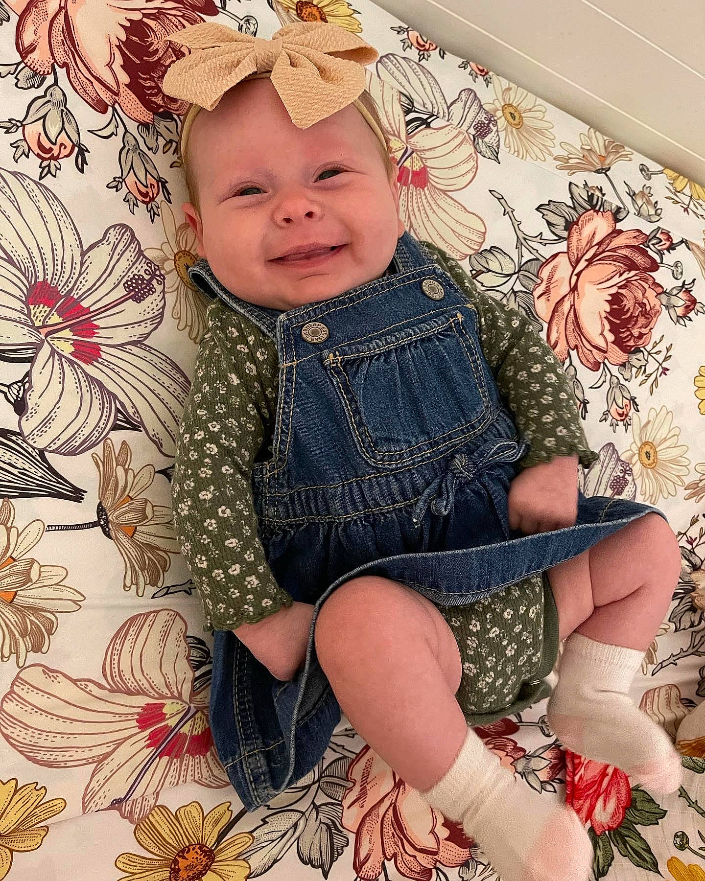 Willow joined the competition — help win amazing prizes! baby, baby_toddler_clothing, child, dress, eye, fashion_accessory, flower, happy, headgear, human_leg, pattern, person, pink, plant, sitting, skin, sleeve, smile, thigh, toddler
