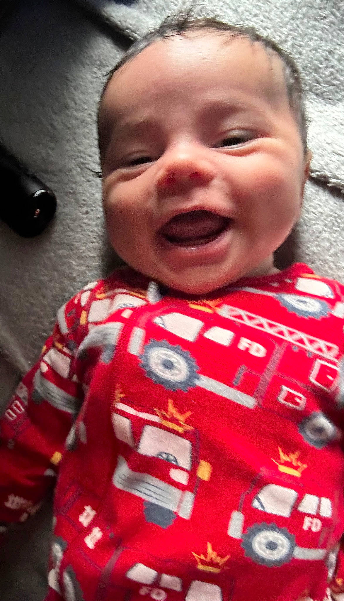 Zayn is registered to the contest to win money with this photo: baby, baby_toddler_clothing, beauty, cheek, child, chin, cool, facial_expression, happy, head, lip, mouth, nose, person, pink, product, skin, sleeve, smile, textile