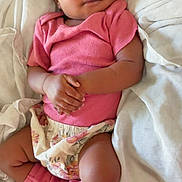 Sequoia joined the competition — help win amazing prizes! baby, infant, pink_clothing, floral, blanket, sleeping, hands_clasped, leg_warmers, soft_texture, cute, resting, indoors, child, newborn, relaxed, portrait, cozy, skin, person, toddler