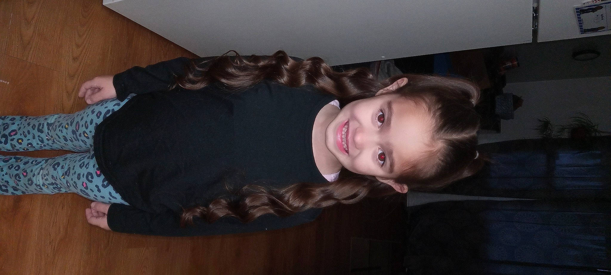 Briella joined the competition — help win amazing prizes! black_hair, cheek, child, comfort, eye, flash_photography, flooring, fun, fur, hairstyle, happy, hardwood, joy, lip, nose, person, portrait_photography, room, sitting, sleeve