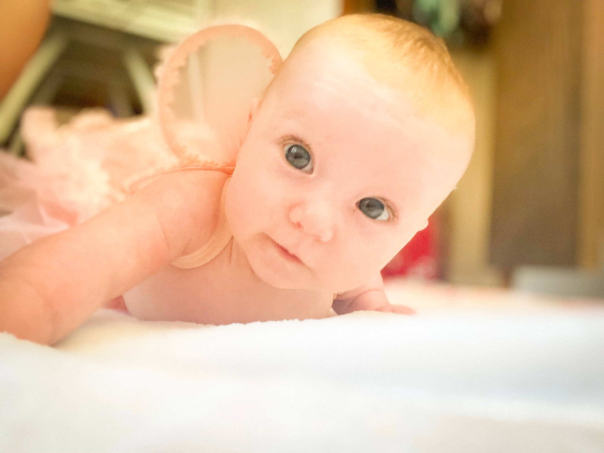 Oakleigh is registered to the contest to win money with this photo: arm, baby, baby_toddler_clothing, cheek, child, comfort, eyelash, finger, flash_photography, flooring, happy, human_body, iris, lip, nose, person, skin, smile, toddler, tummy_time