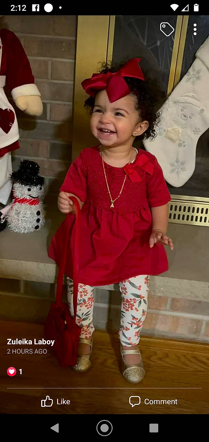 Alani is registered to the contest to win money with this photo: baby_toddler_clothing, child, costume, costume_hat, design, event, face, fashion_accessory, fashion_design, happy, headgear, headwear, joy, magenta, pattern, person, pink, red, sleeve, smile